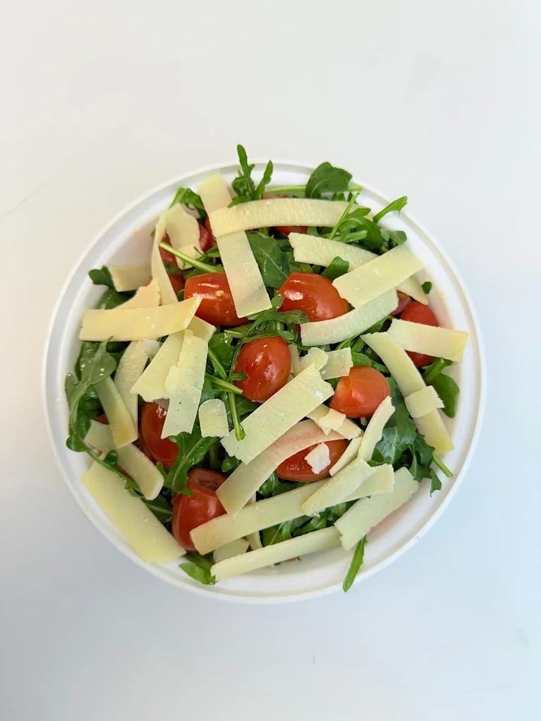 Fully loaded pizza and appetizers at Strathcona Pizza - Best pizza in Edmonton